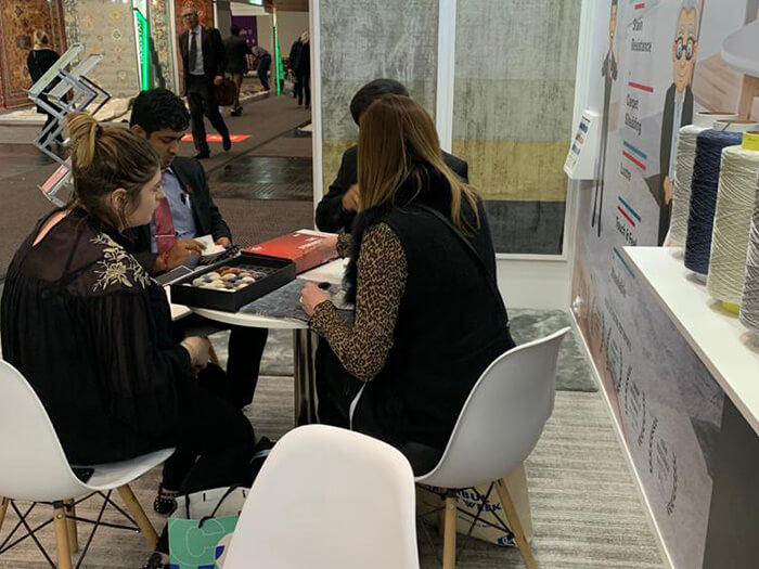 Professionals Discussing Textile Samples