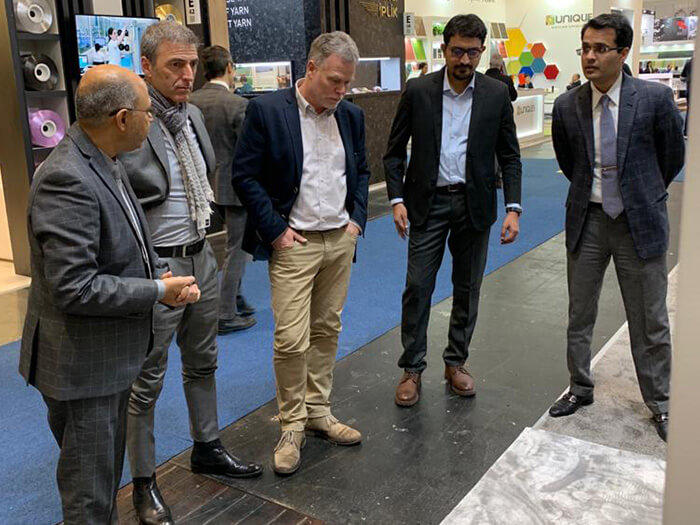 Discussion on a Trade Exhibition Floor