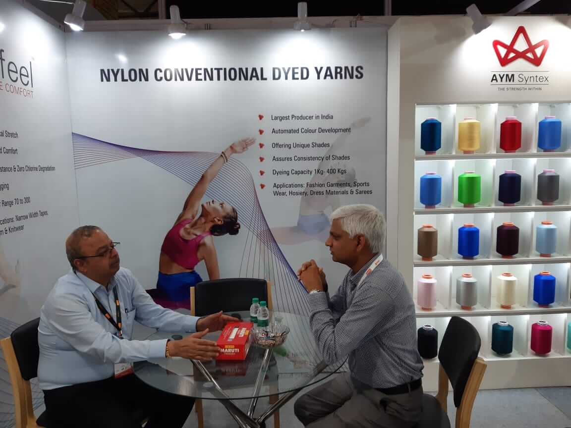 Business Meeting at an Exhibition Booth