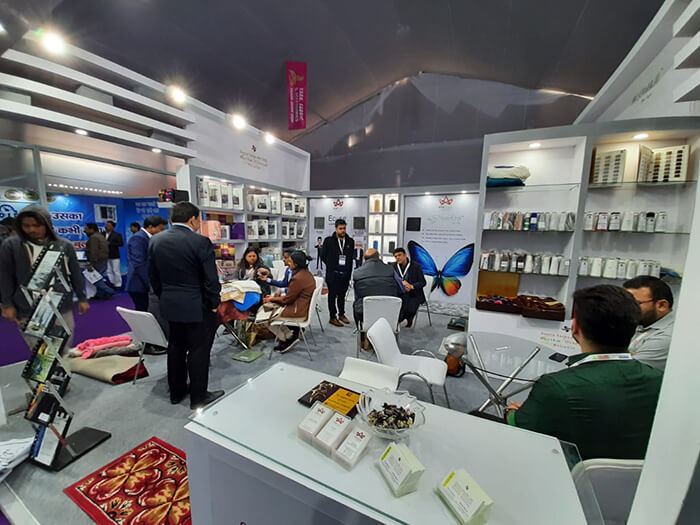 Professionals Engaging at the Exhibition Booth