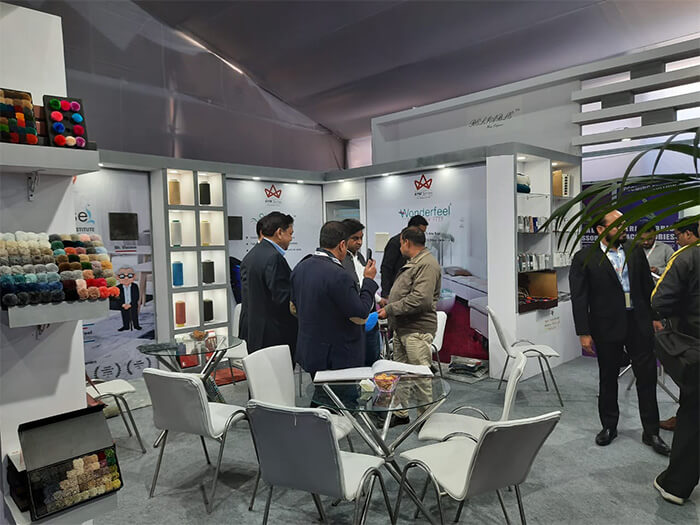 Professionals at the Textile Exhibition Booth, Trade Show India